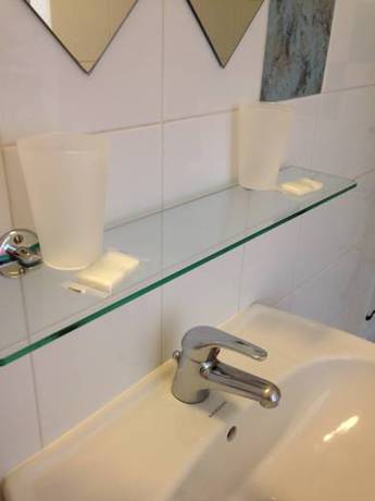 Imagen de la habitación del Residella Apparthotel. Foto 8