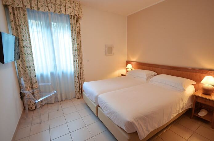 Imagen de la habitación del Residence Alle Palme. Foto 19