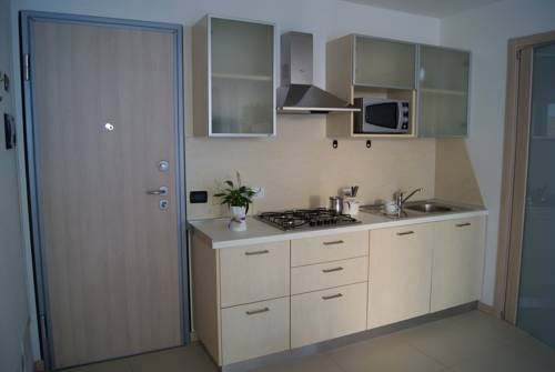 Imagen de la habitación del Residence Aprilia. Foto 12