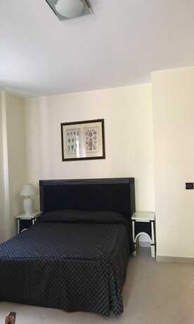 Imagen de la habitación del Residence Baia dei Delfini. Foto 15
