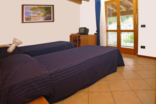 Imagen de la habitación del Residence Borgo Dei Limoni. Foto 9