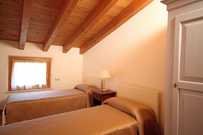 Imagen de la habitación del Residence Borgo Mondragon. Foto 3