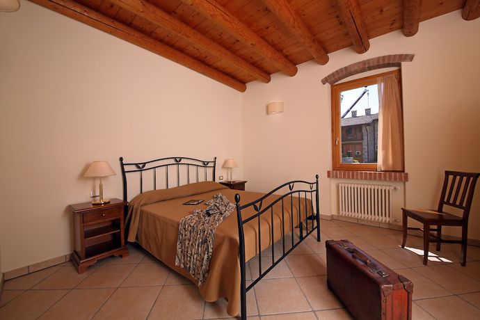 Imagen de la habitación del Residence Borgo Mondragon. Foto 5