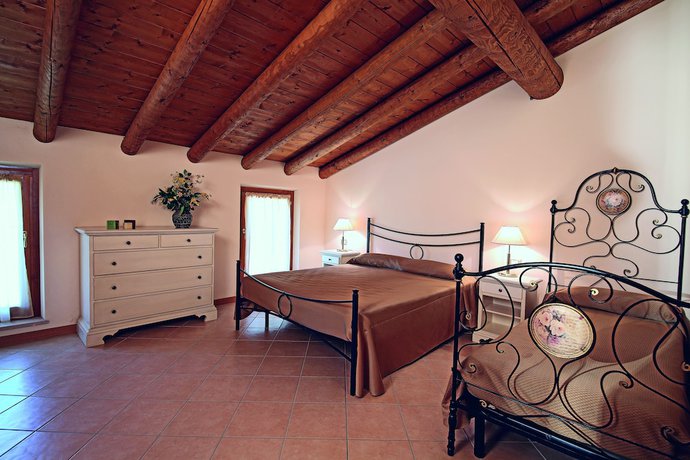 Imagen de la habitación del Residence Borgo Mondragon. Foto 7
