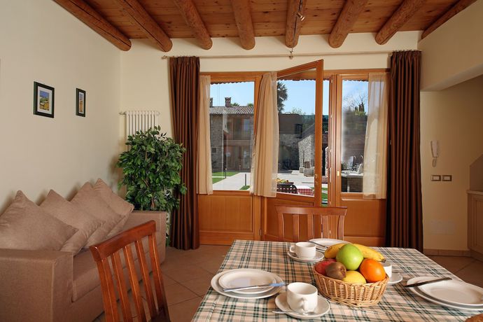 Imagen de la habitación del Residence Borgo Mondragon. Foto 11