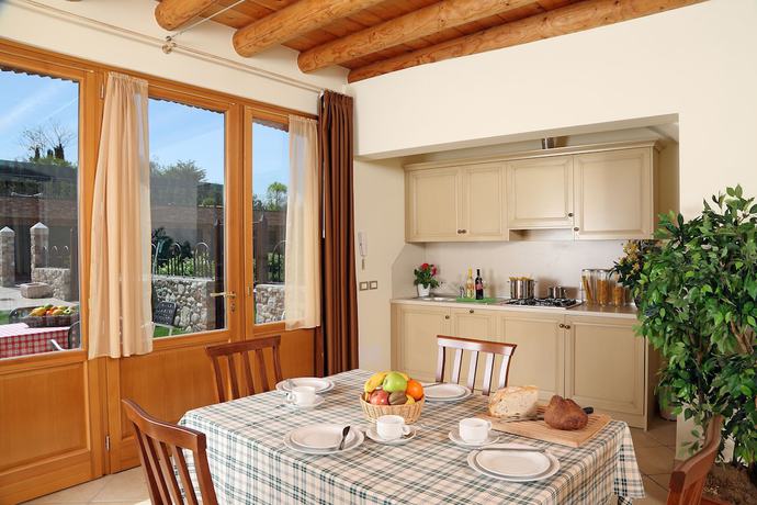 Imagen de la habitación del Residence Borgo Mondragon. Foto 13