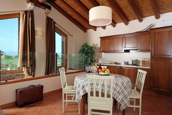 Imagen de la habitación del Residence Borgo Mondragon. Foto 19