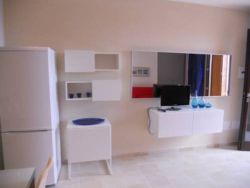 Imagen de la habitación del Residence Borgo Punta Villa. Foto 8