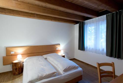 Imagen de la habitación del Residence Civetta. Foto 13