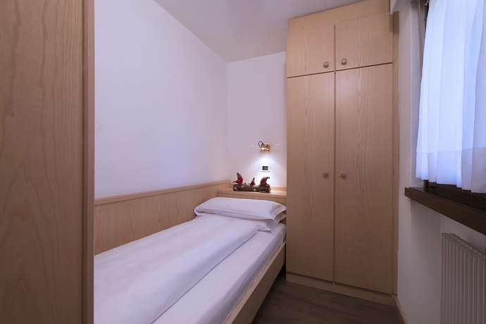 Imagen de la habitación del Residence Contrin. Foto 3