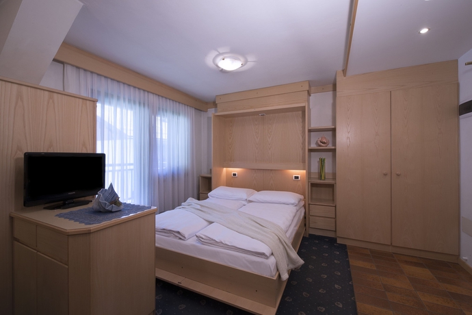 Imagen de la habitación del Residence Contrin. Foto 4