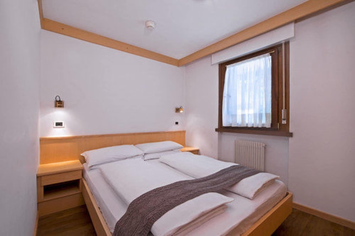 Imagen de la habitación del Residence Contrin. Foto 6