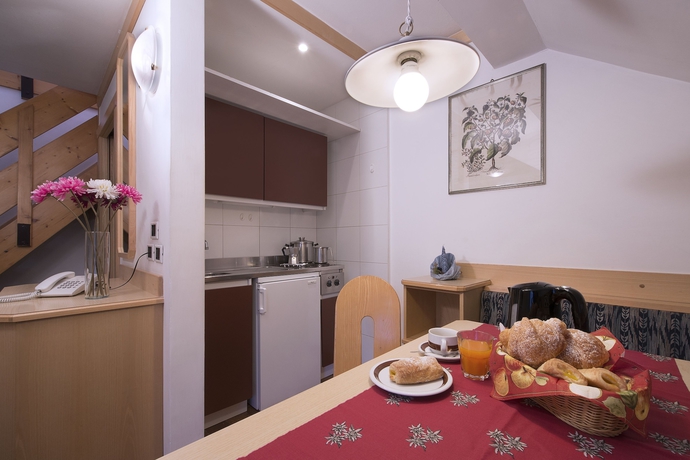 Imagen de la habitación del Residence Contrin. Foto 9