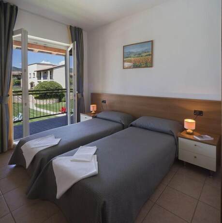 Imagen de la habitación del Residence Corte Delle Rose. Foto 10