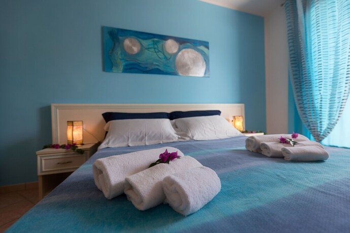 Imagen de la habitación del Residence Costa d'Otranto. Foto 19