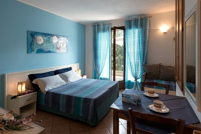 Imagen de la habitación del Residence Costa d'Otranto. Foto 20