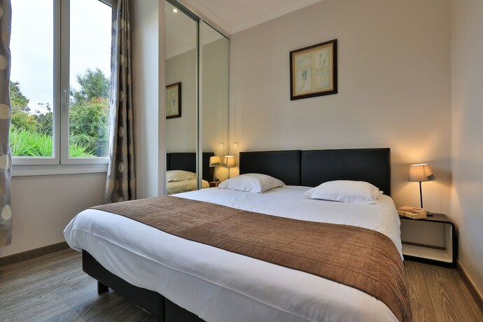 Imagen de la habitación del Residence Emeraude. Foto 18