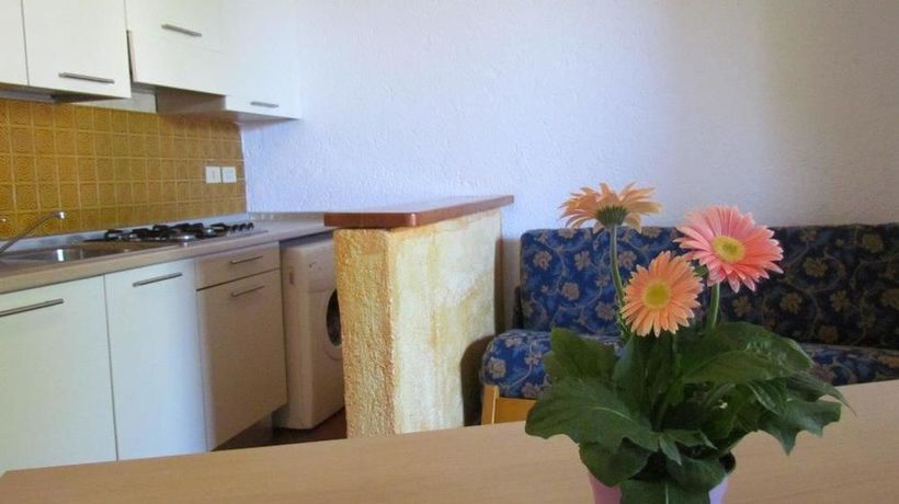 Imagen de la habitación del Residence Frontemare Baia Santa Reparata. Foto 8