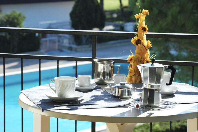 Imagen de la habitación del Residence Habitat A Marina Di Bibbona. Foto 6