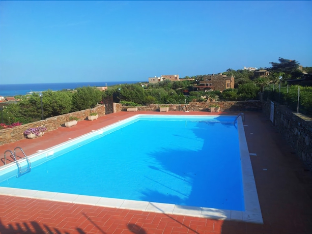 Imagen de la piscina del Residence Il Poggio, STINTINO. Foto 19