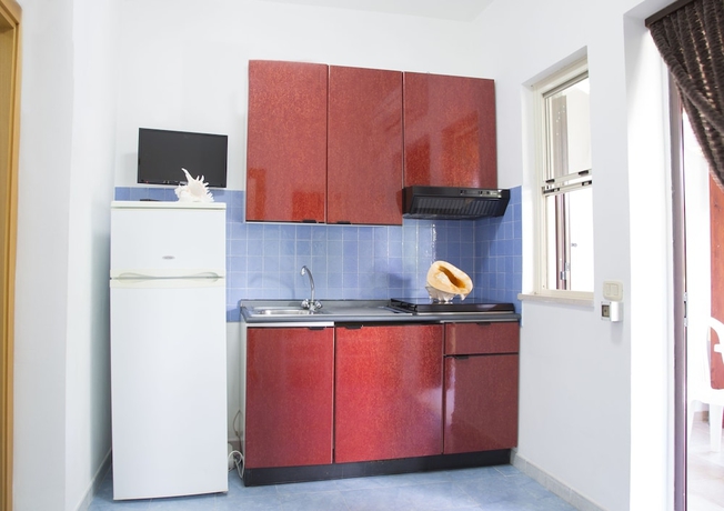Imagen de la habitación del Residence La Conchiglia. Foto 10
