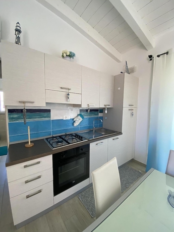 Imagen de la habitación del Residence La Marina. Foto 6