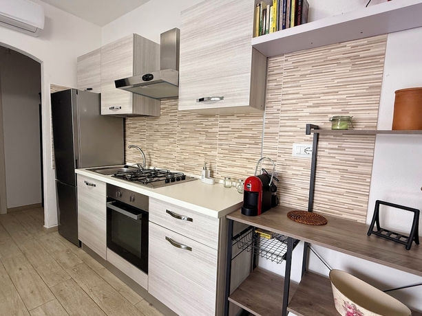 Imagen de la habitación del Residence La Marina. Foto 9