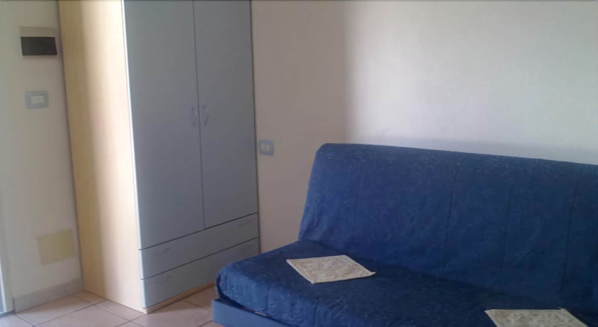 Imagen de la habitación del Residence La Pineta. Foto 12