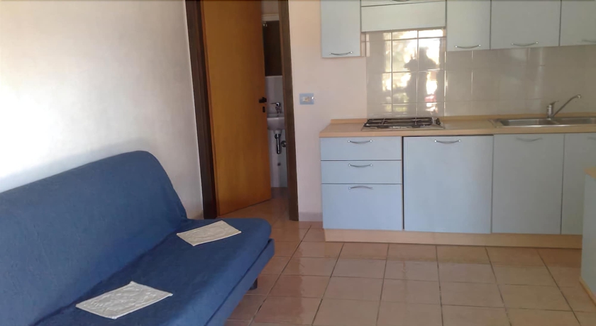 Imagen de la habitación del Residence La Pineta. Foto 13