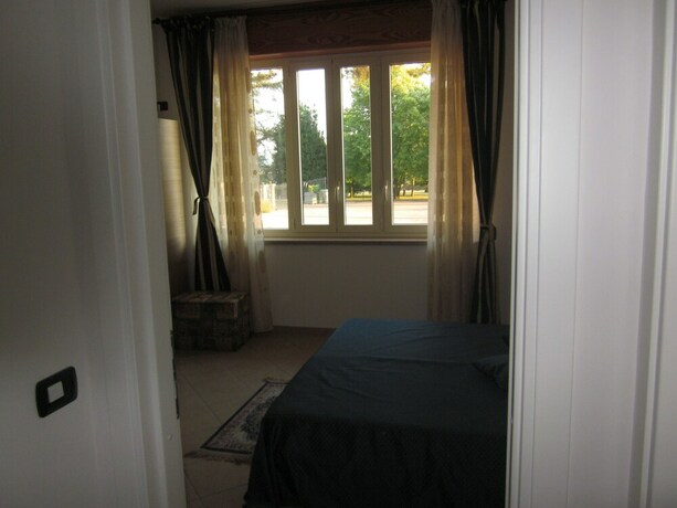 Imagen de la habitación del Residence La Quiete. Foto 32