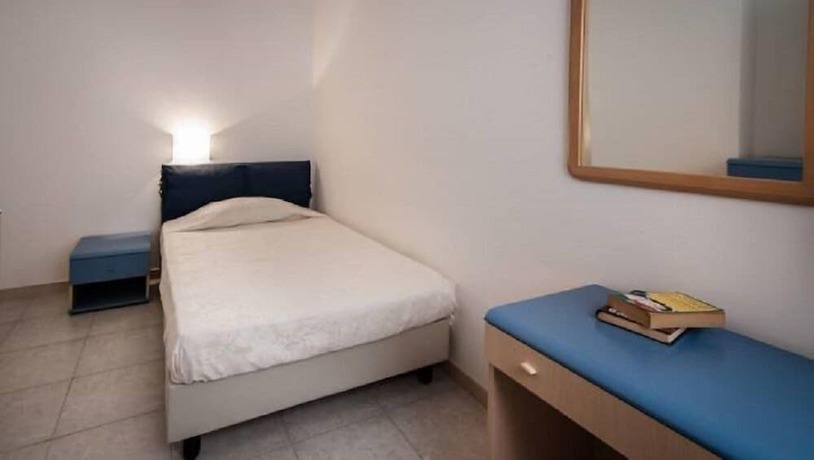 Imagen de la habitación del Residence La Rosa di Nettuno. Foto 14