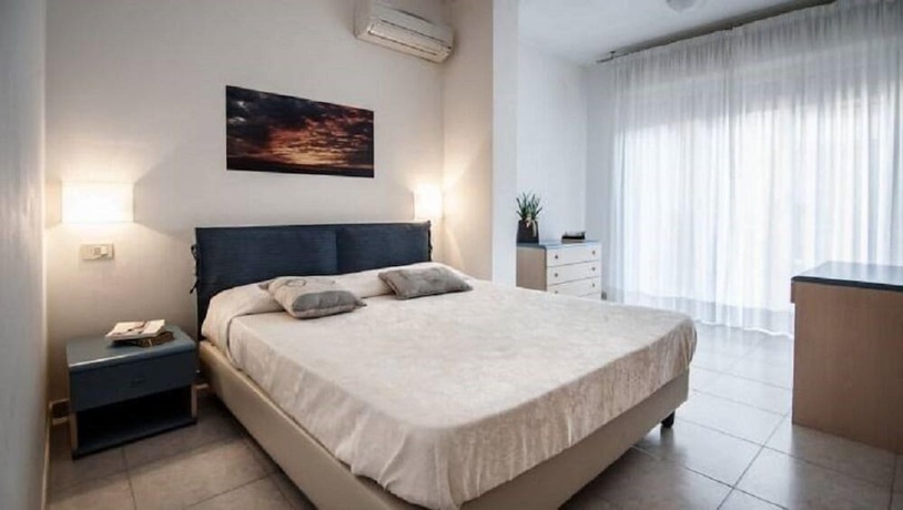 Imagen de la habitación del Residence La Rosa di Nettuno. Foto 19