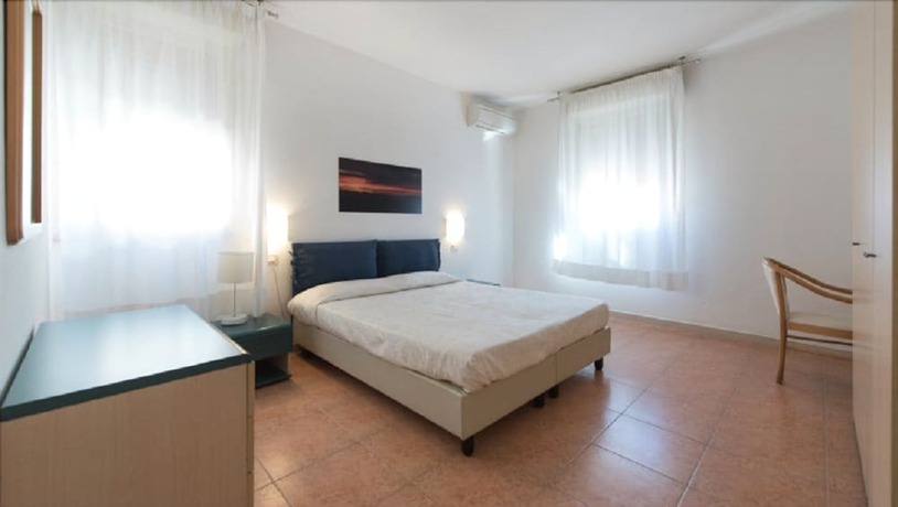 Imagen de la habitación del Residence La Rosa di Nettuno. Foto 20