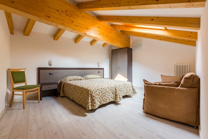 Imagen de la habitación del Residence La Vigna. Foto 11