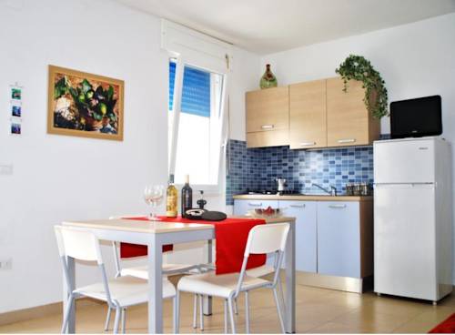 Imagen de la habitación del Residence Le Palme. Foto 9