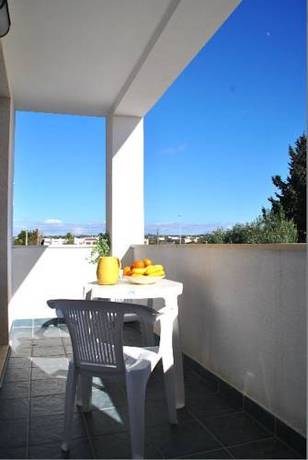 Imagen de la habitación del Residence Le Palme. Foto 16