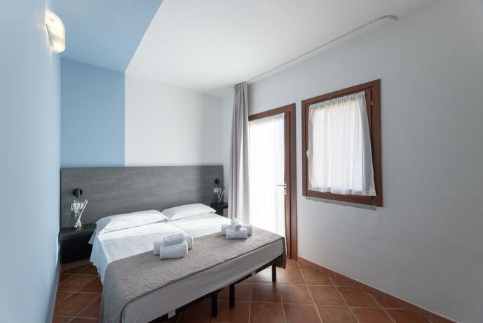 Imagen general del Residence Le Rocce Rosse. Foto 61