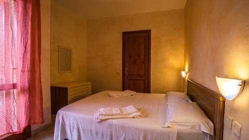 Imagen de la habitación del Residence Lu Lamoni, Aglientu. Foto 6