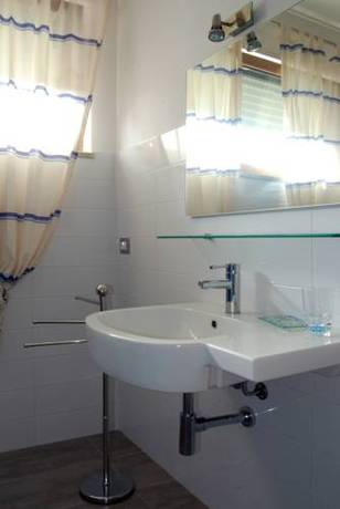 Imagen de la habitación del Residence Lungomare. Foto 7