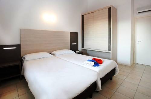 Imagen de la habitación del Residence Maroadi, Torbole Sul Garda. Foto 12