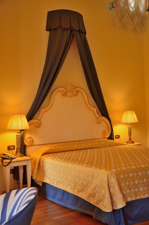 Imagen de la habitación del Residence Michelangiolo. Foto 5