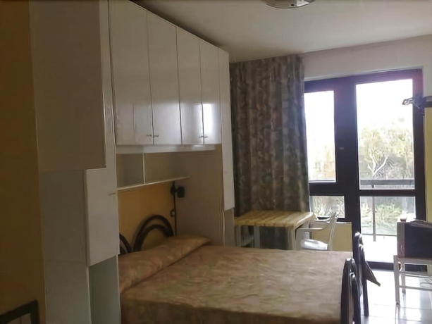 Imagen de la habitación del Residence Nettuno. Foto 7
