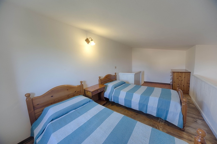 Imagen de la habitación del Residence Oasi E Oasi Blu. Foto 7
