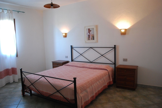 Imagen de la habitación del Residence Oasi E Oasi Blu. Foto 9