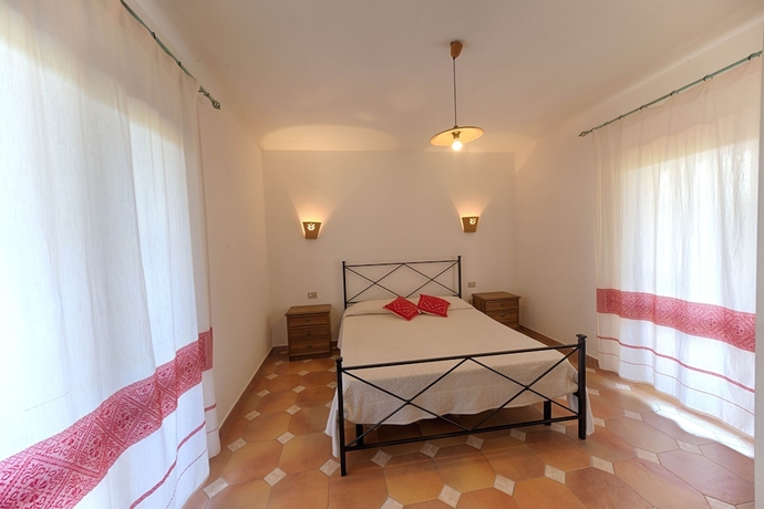 Imagen de la habitación del Residence Oasi E Oasi Blu. Foto 17