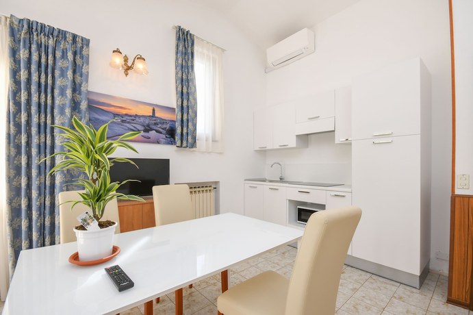 Imagen de la habitación del Residence Oasi. Foto 5