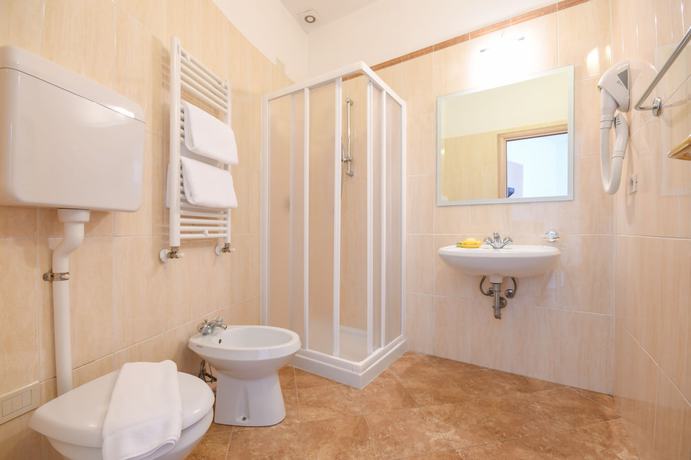 Imagen de la habitación del Residence Oasi. Foto 8