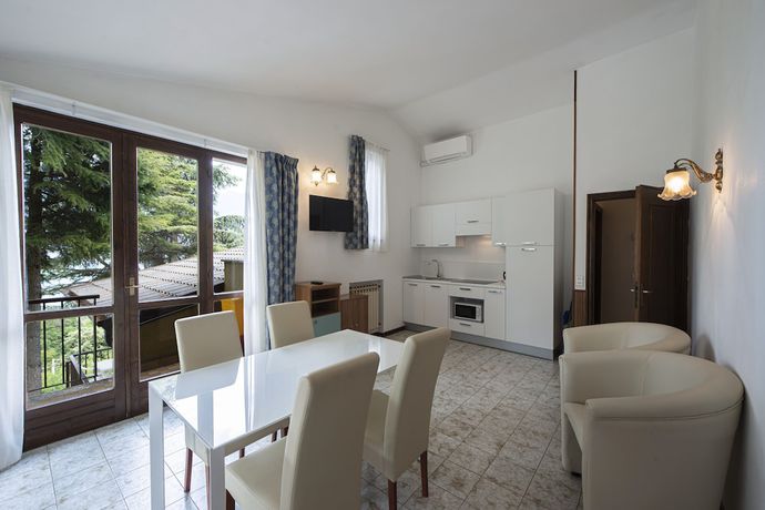 Imagen de la habitación del Residence Oasi. Foto 9