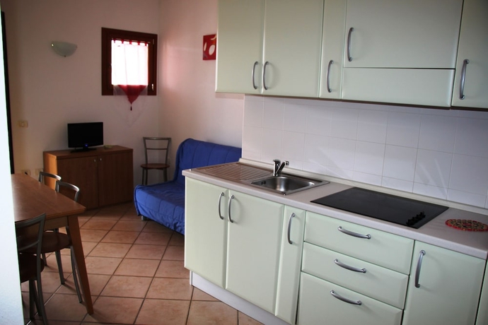 Imagen de la habitación del Residence Olimpo. Foto 7