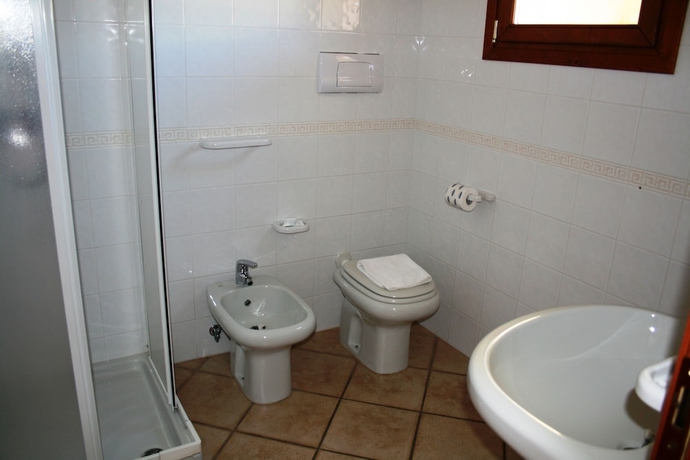 Imagen de la habitación del Residence Olimpo. Foto 11